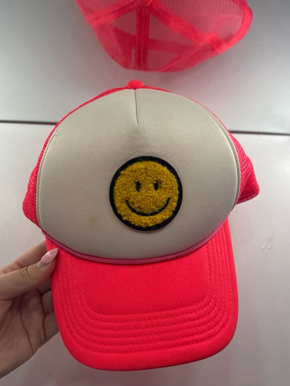 Pink Trucker Hat with Yellow Smiley Patch